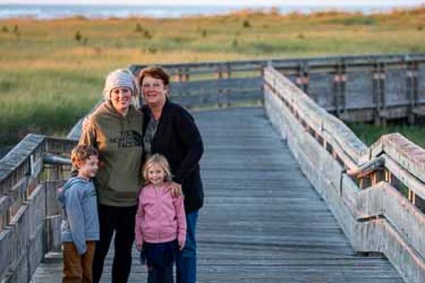 Familly on the boardwalk, mom, grandma two small children