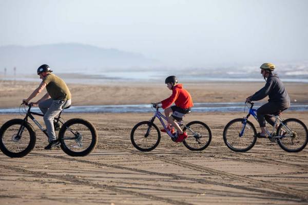 Biking on the world's largest beach is free Bikers on the beach