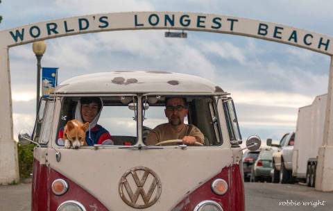 1962 VW Bus in front of World's Longest Beach sign