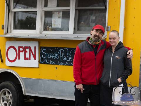 Sierra's is a great stop for breakfast Sierra and Gil in front of their Food Truck