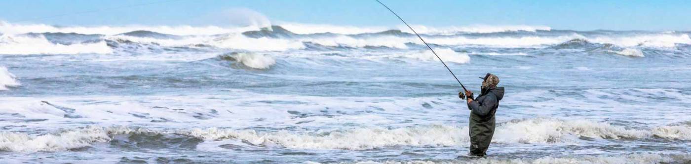 Woman surf fishing near Seaview Washington